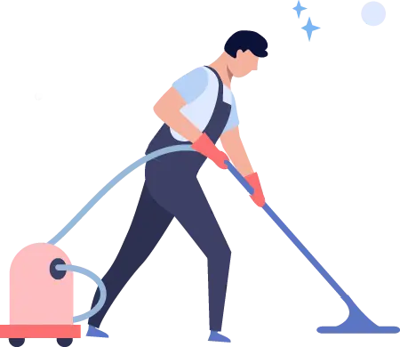 Reinigungskraft saugt mit Industriestaubsauger