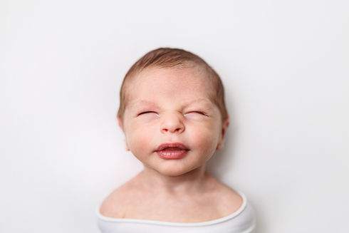 newborn session, newborn photography, newborn photographer near me, newborn expressions, newborn smiles, newborn portrait in white, newborn headshots, newborn macro photography, newborn faces, newborn session portraits