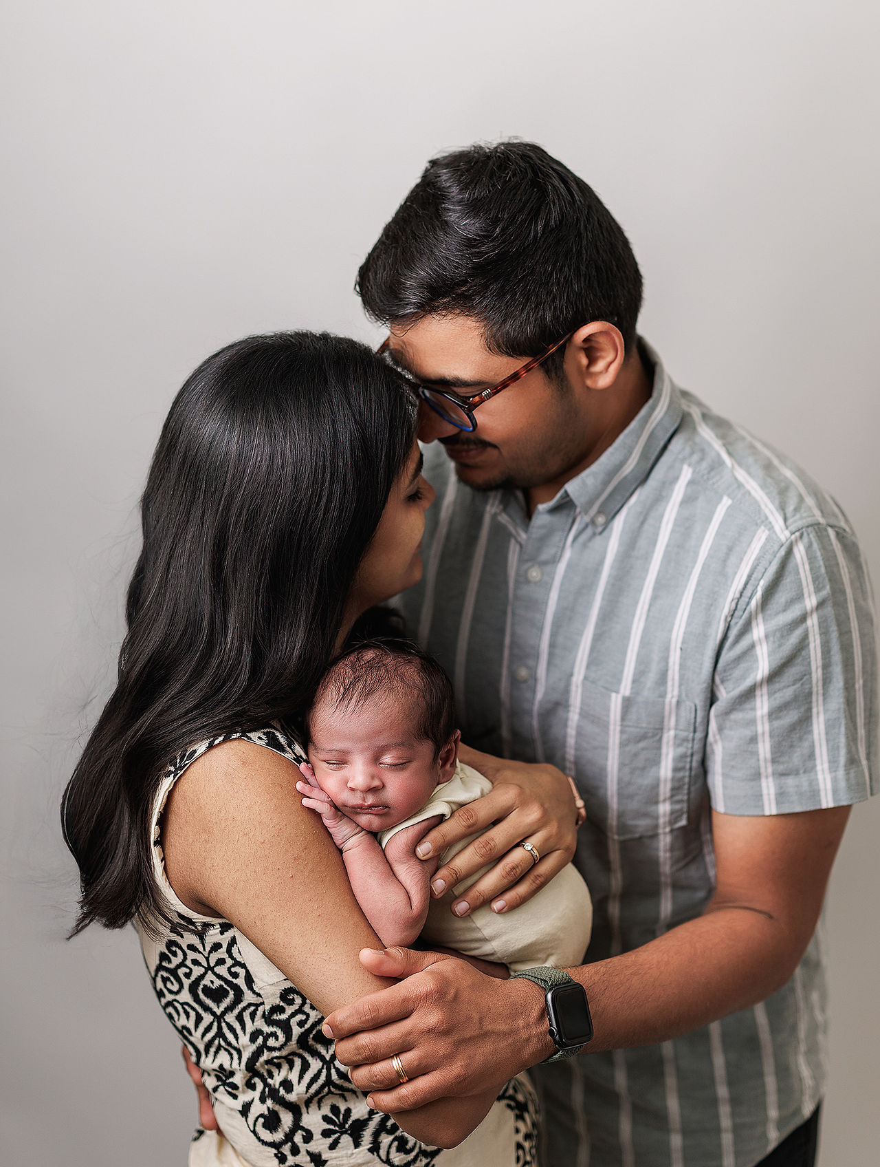 newborn family photography on white background