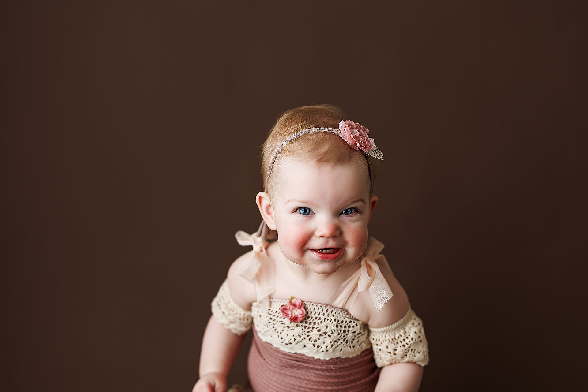 noblesville child photographer, fishers child photographer, child photographer near me, milestone photographer, milestone photography on brown background in boho chair