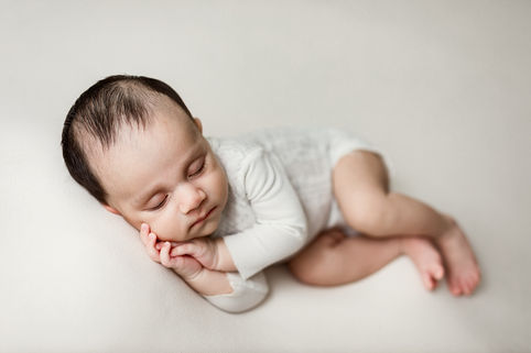 older baby newborn session, 6 week old newborn session, side laying newborn session pose