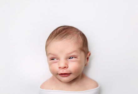 newborn session, newborn photography, newborn photographer near me, newborn expressions, newborn smiles, newborn portrait in white, newborn headshots, newborn macro photography, newborn faces, newborn session portraits