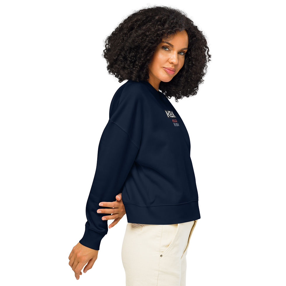 Thumbnail: Woman in navy blue sweatshirt, side view
