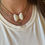 Thumbnail: Vintage Trifari white lucite butterfly necklace