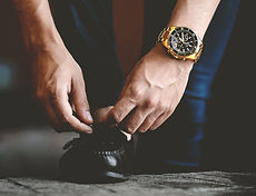 Man Tying Shoelaces