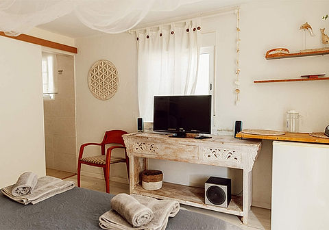 Can Mimosa Retreat in Tortosa is a family-run eco sanctuary in Catalonia offering off-grid sustainable accommodation.