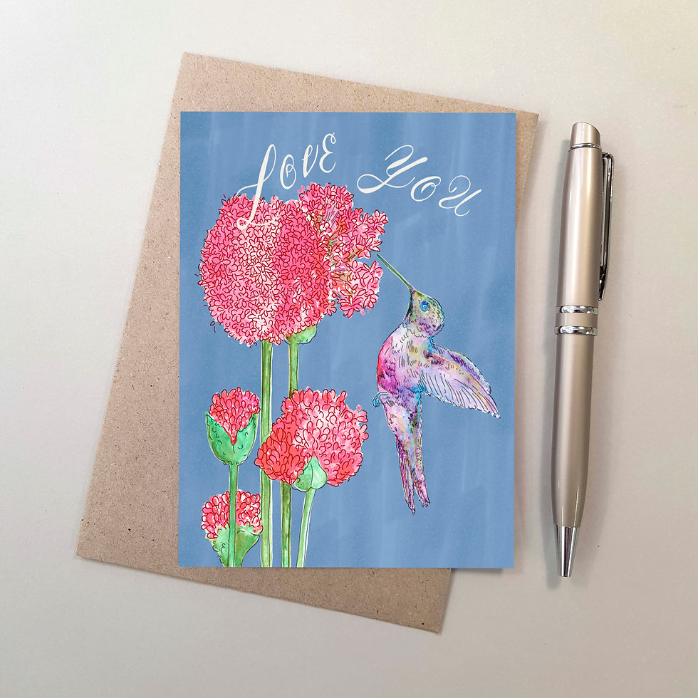 Thumbnail: A Hummingbird Bird and Pink Flowers on a Blue Greeting Card Front View with a pen