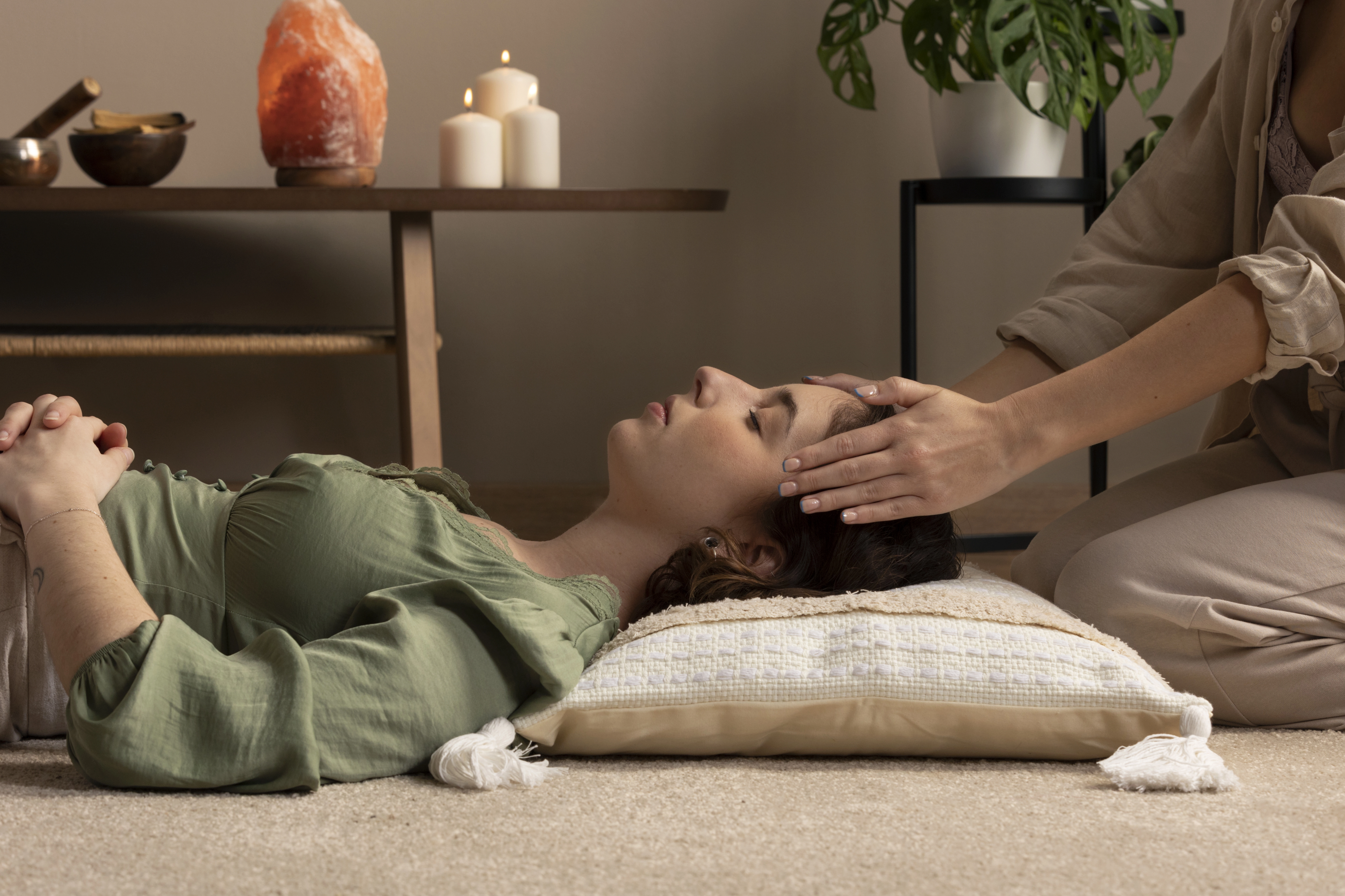 person-conducting-reiki-therapy.webp