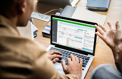 414005 People working with MacBook Pro.jpg