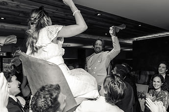 The couple making their entrance, in black and white