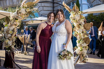 Sabrina and a friend, bouquet in hand
