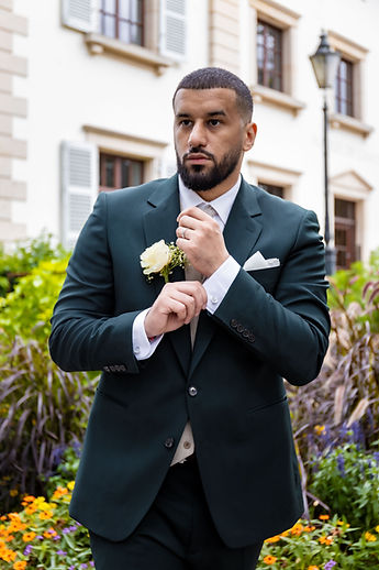 Marouan adjusts his cufflink