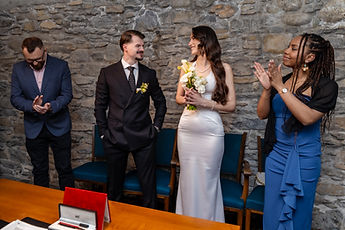 The witnesses applauding the couple