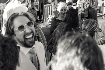 Derek laughing out loud, in black and white