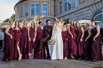 Group photo with the friends in burgundy
