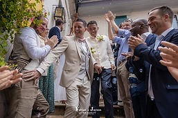 The grooms' exit to applause