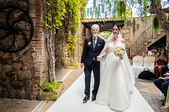 Gemma's entrance into the courtyard, on a loved one's arm