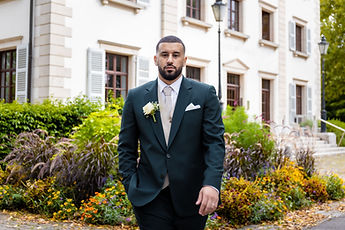Marouan looks at the camera, hands in his pockets