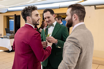 Final touches to the boutonnière before the ceremony