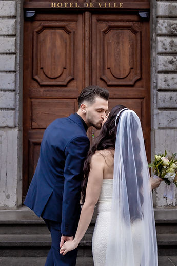 Mersim kissing Leonora's shoulder