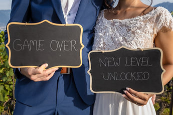 “Game over” and “New level unlocked” chalkboards