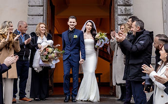 The newlyweds' exit to applause