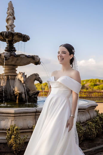 Portrait of Gemma in front of the fountain, in the evening light