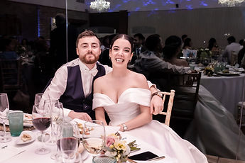 Gemma and Jean, close together at their table