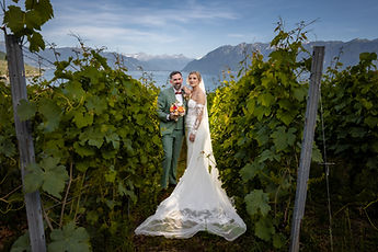 The couple in the vineyards, with Lake Geneva and the Alps as a backdrop