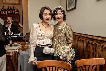 Ly and a friend, bouquet in hand