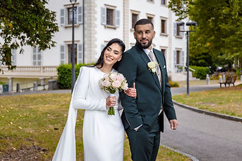 Leila tilts her head towards Marouan, outside the town hall