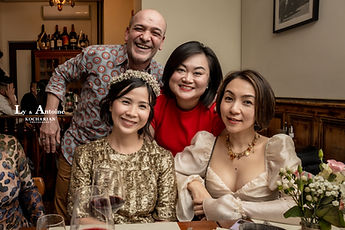 Ly surrounded by loved ones at the table