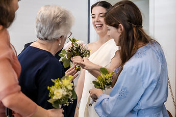 Loved ones congratulating the couple after the ceremony