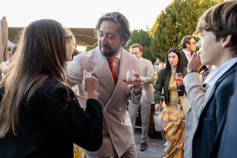 Derek and his guests in the golden light