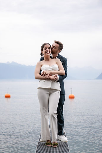 Gemma and Jean embracing on the jetty