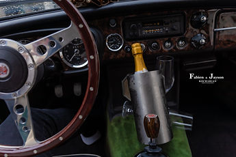 Champagne on ice in the vintage car
