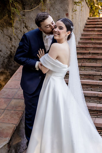 A kiss on the cheek that makes Gemma laugh