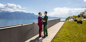 The grooms on the terrace, with a panorama of Lake Geneva and the mountains