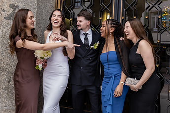 The newlyweds and their friends, a joyful group photo