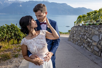 Antoine holding Liliane, the lake in the background