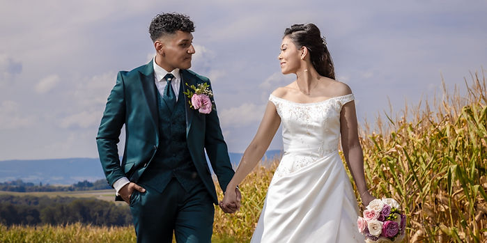 Newlyweds walking hand in hand