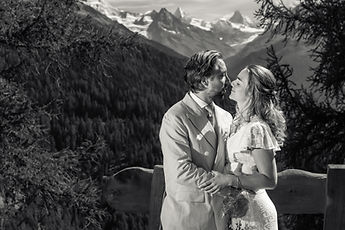 The couple embracing, in black and white