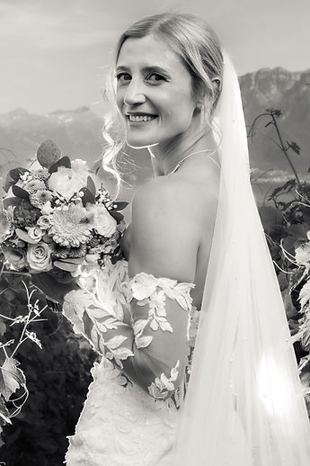 Portrait of Vahide with her bouquet, in black and white