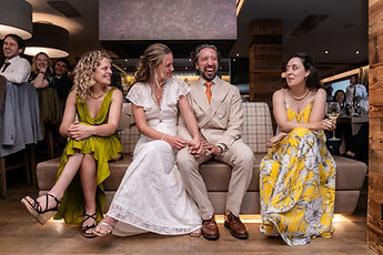 The couple seated between two friends