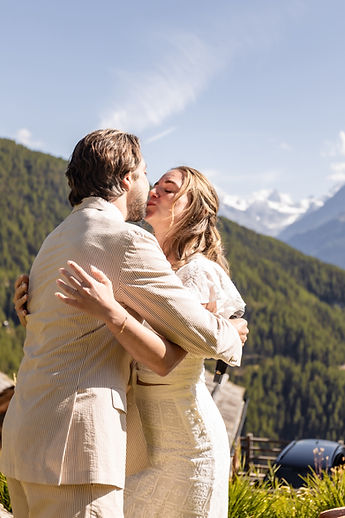 The couple embracing after the vows