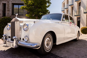 The vintage car, decorated for the wedding