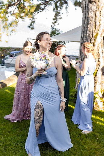 The guest with the bouquet, all smiles