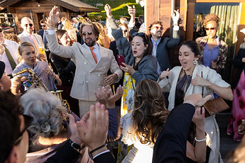 Derek dancing among his guests