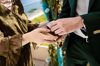 Detail: the ring box is handed over
