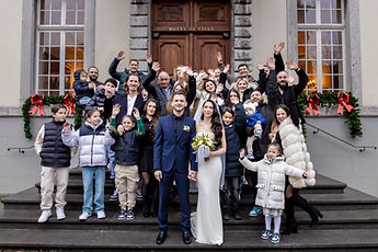Guests raising their arms for the group photo